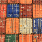 Neatly stacked shipping containers
